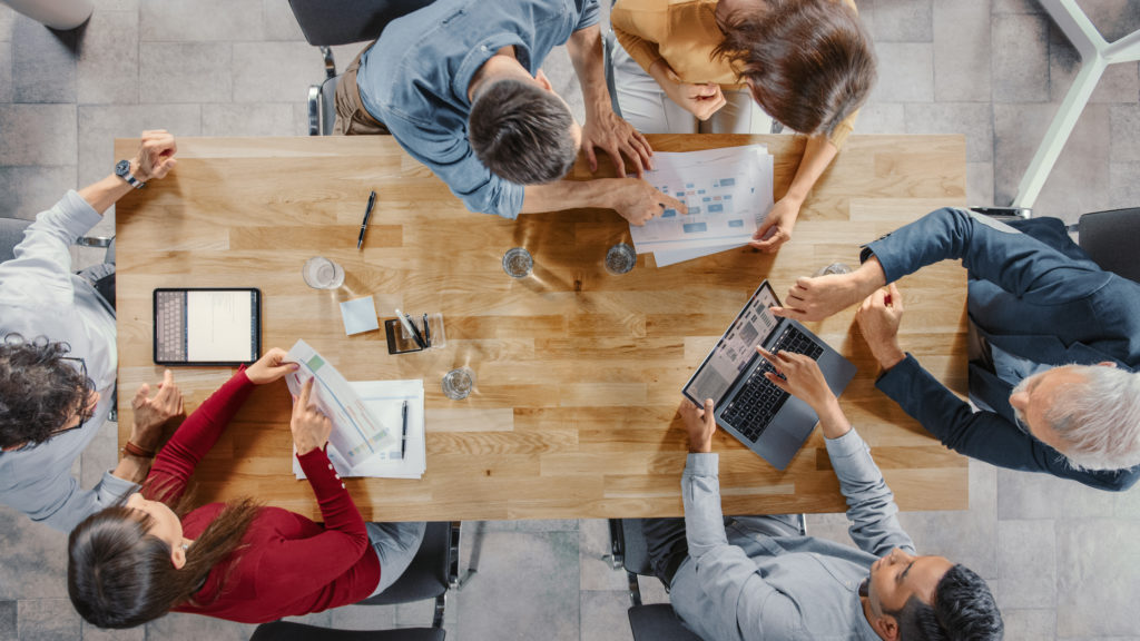 People sitting around a table working